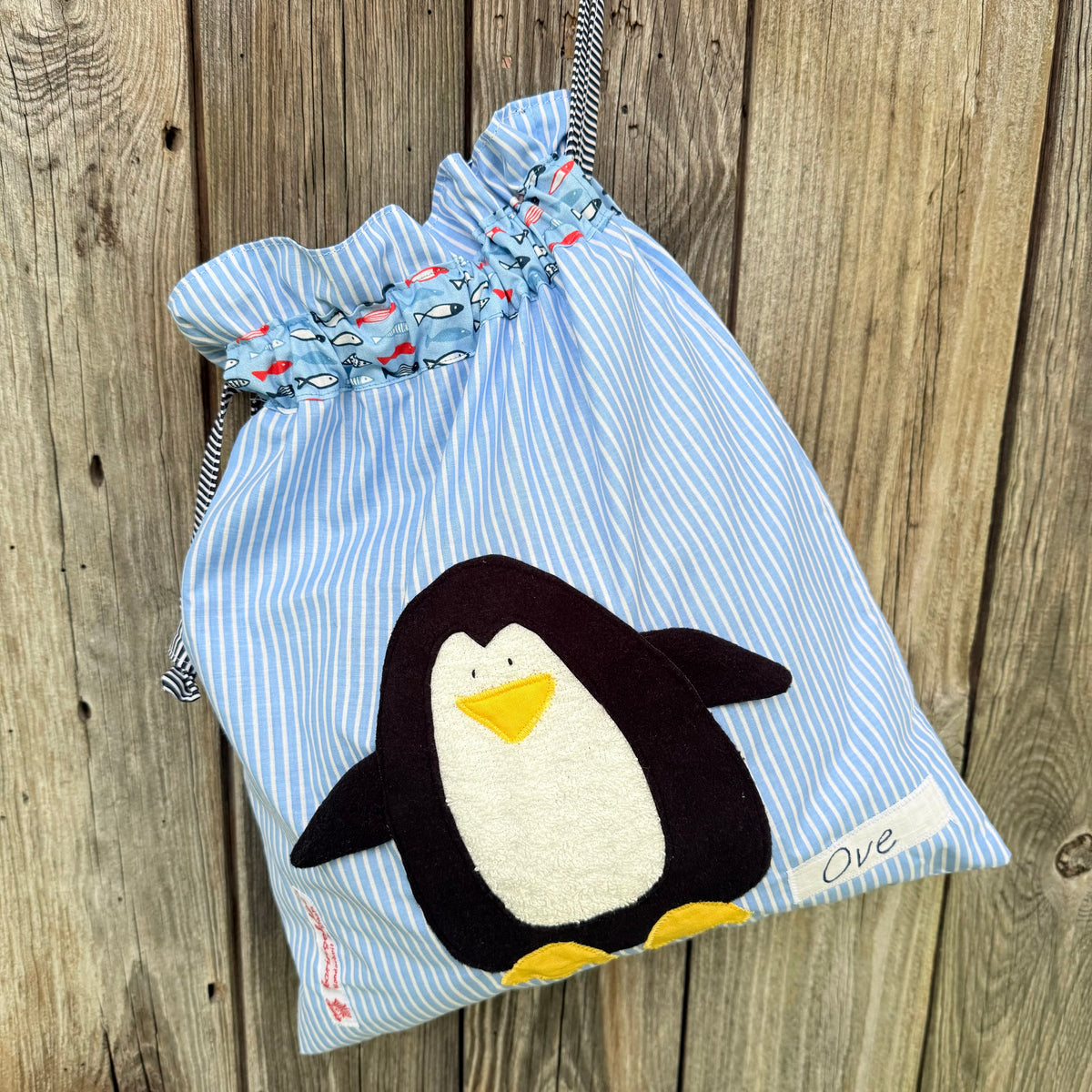 Personalisierte Nasstasche für Jungen – Pinguin
